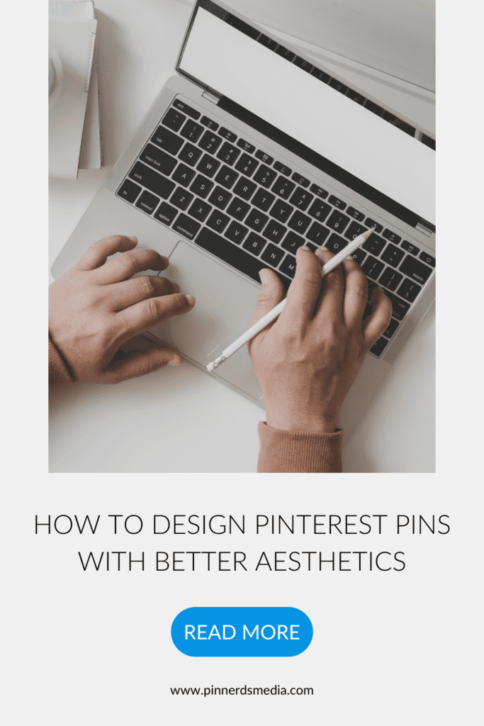 Close-up of hands working on a laptop, using a stylus for design, with text on designing Pinterest pins with better aesthetics.