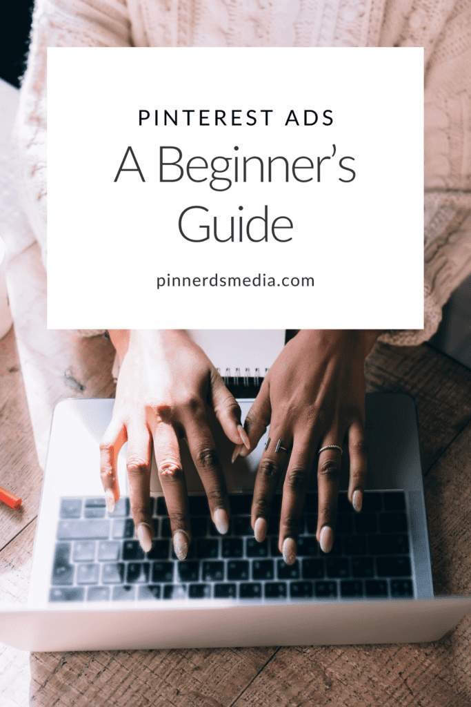 A person typing on a laptop, featuring a guide titled 'Pinterest Ads: A Beginner’s Guide'.