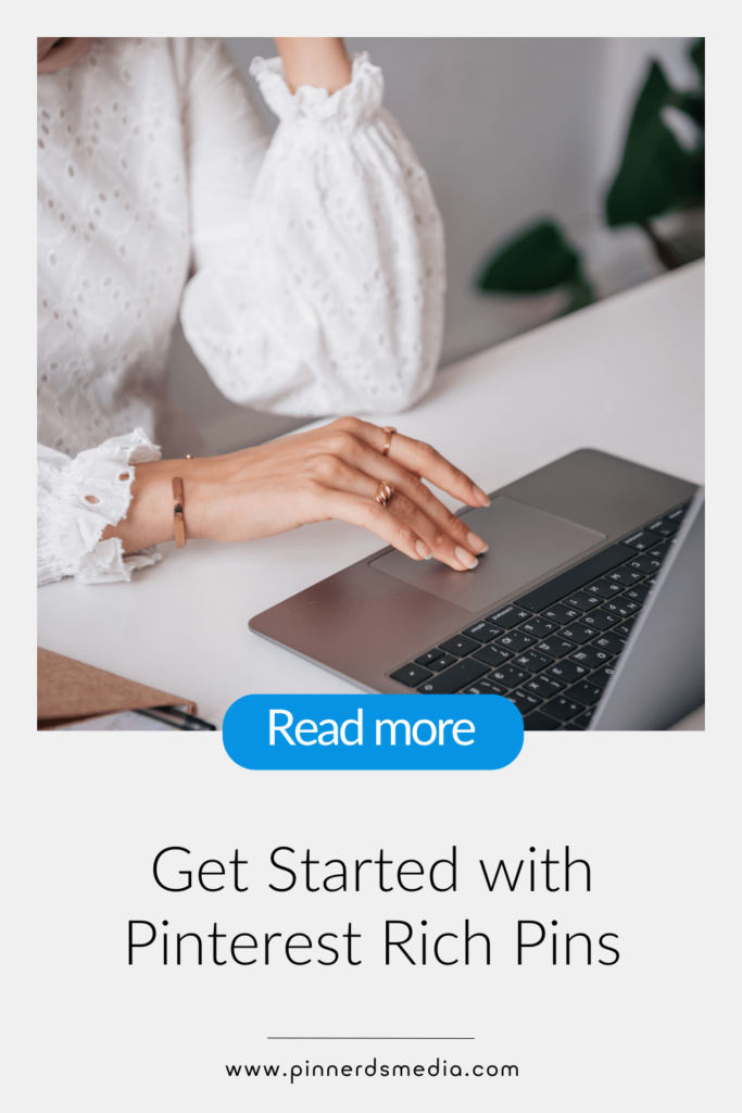 Close-up of a woman's hands typing on a laptop, learning how to start with Pinterest Rich Pins.